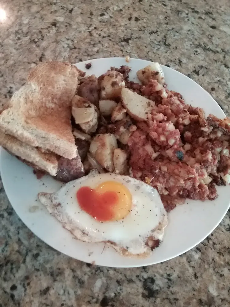 One Egg with Corned Beef Hash and Home Fries